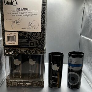 Set of 8 shot glasses. Never used. Made by Wink. Holds 2.5oz each